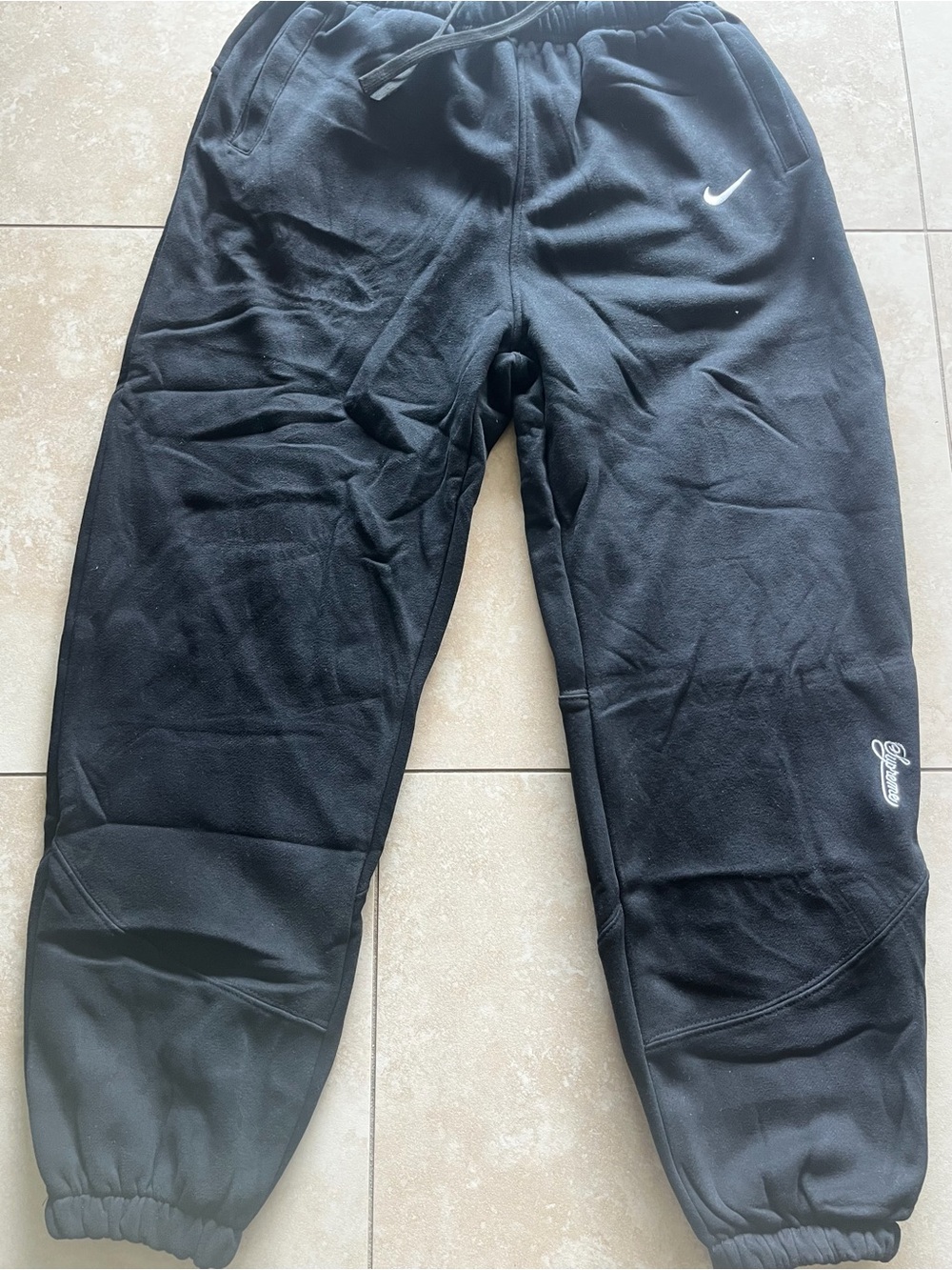 Nike Black Jogger Sweatpants with White Swoosh